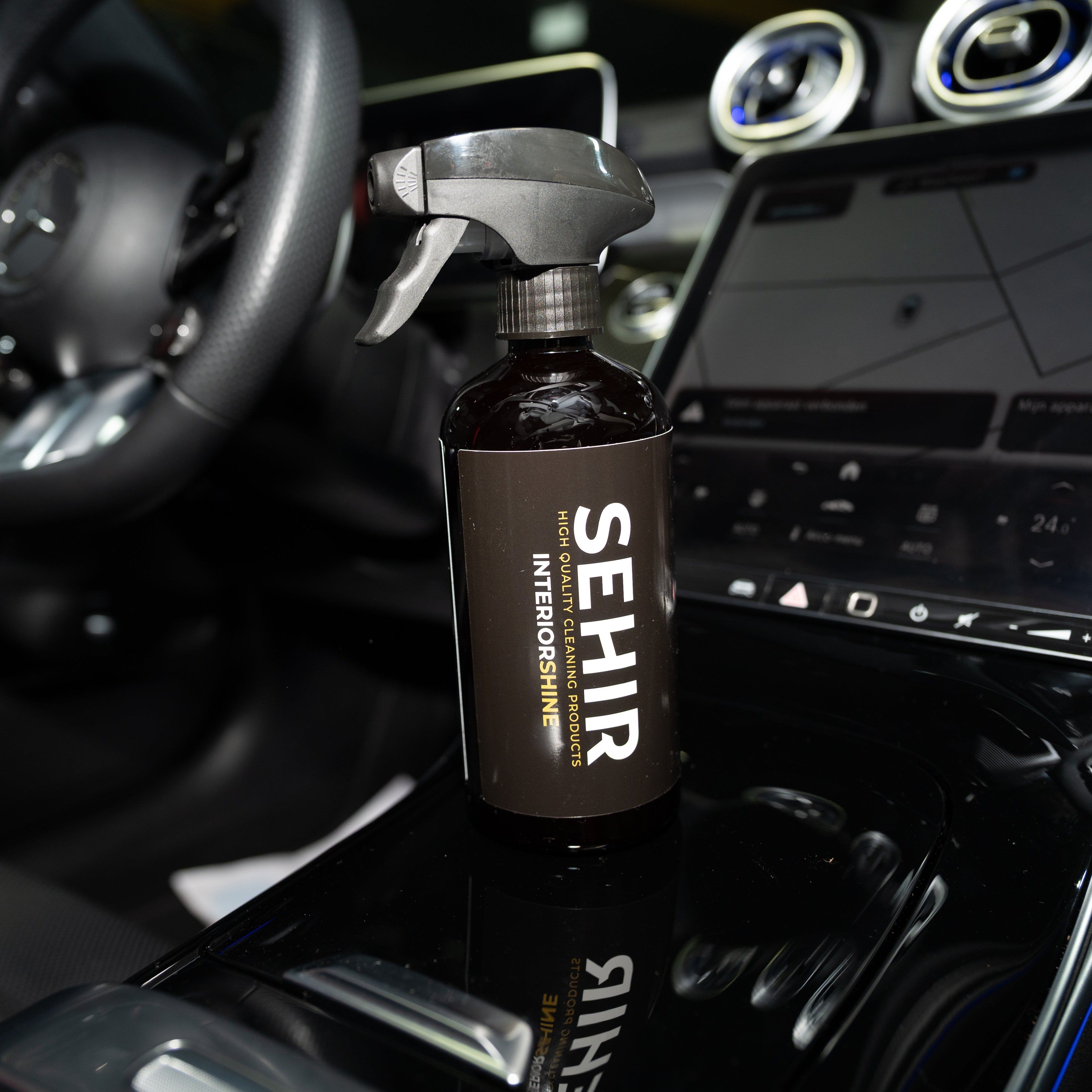 SEHIR car interior cleaning spray bottle on a car dashboard