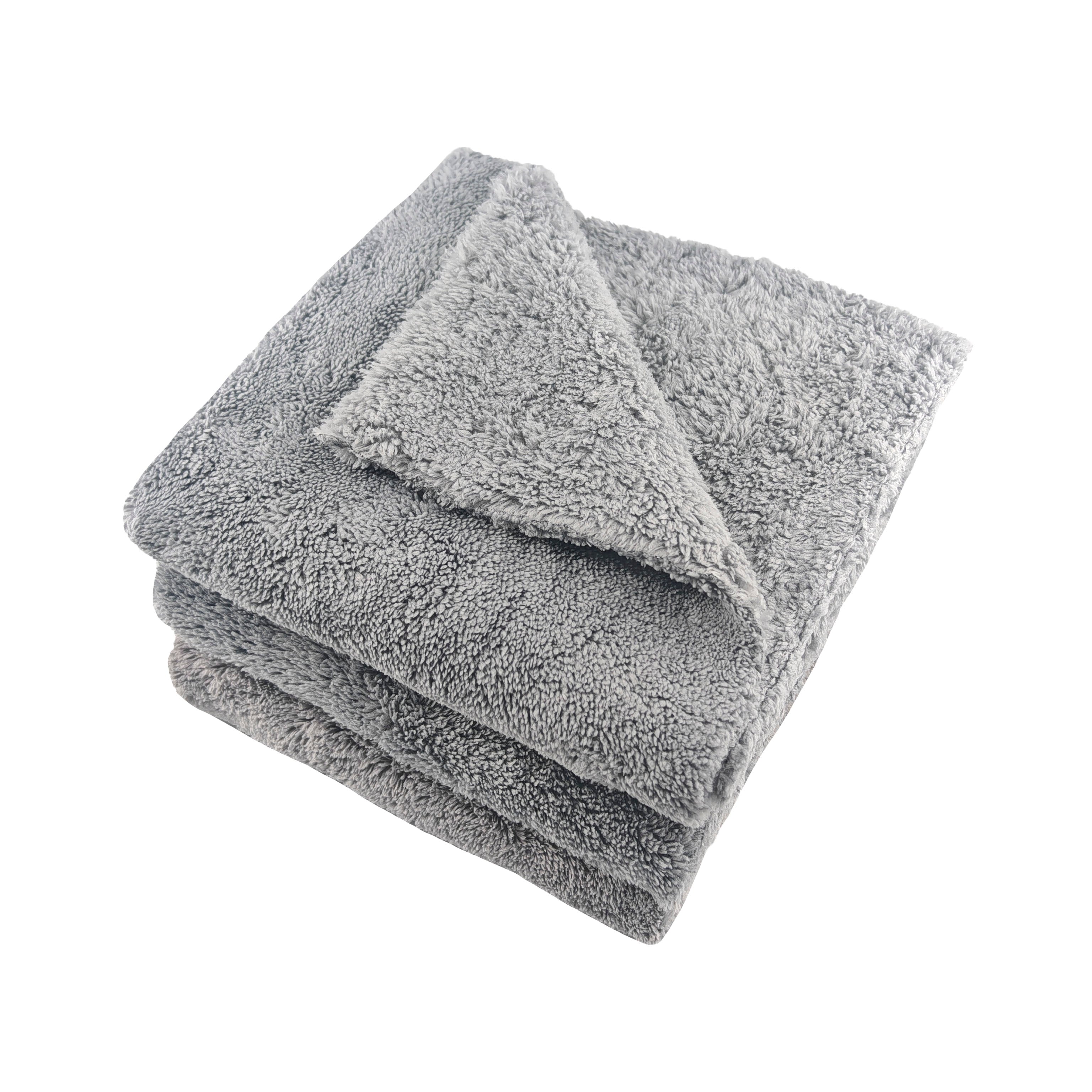 Stack of gray towels on a white background