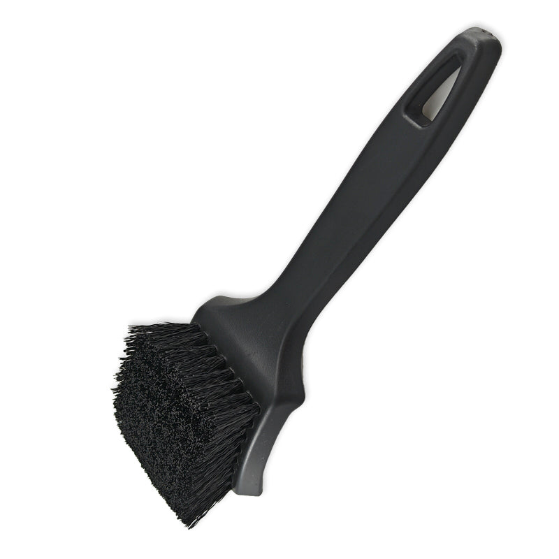 Black brush with bristle head on a white background