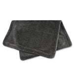 Folded dark gray towel on a white background