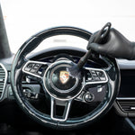 Steering wheel of a Porsche car cleaning with Interior Soft Brush Set