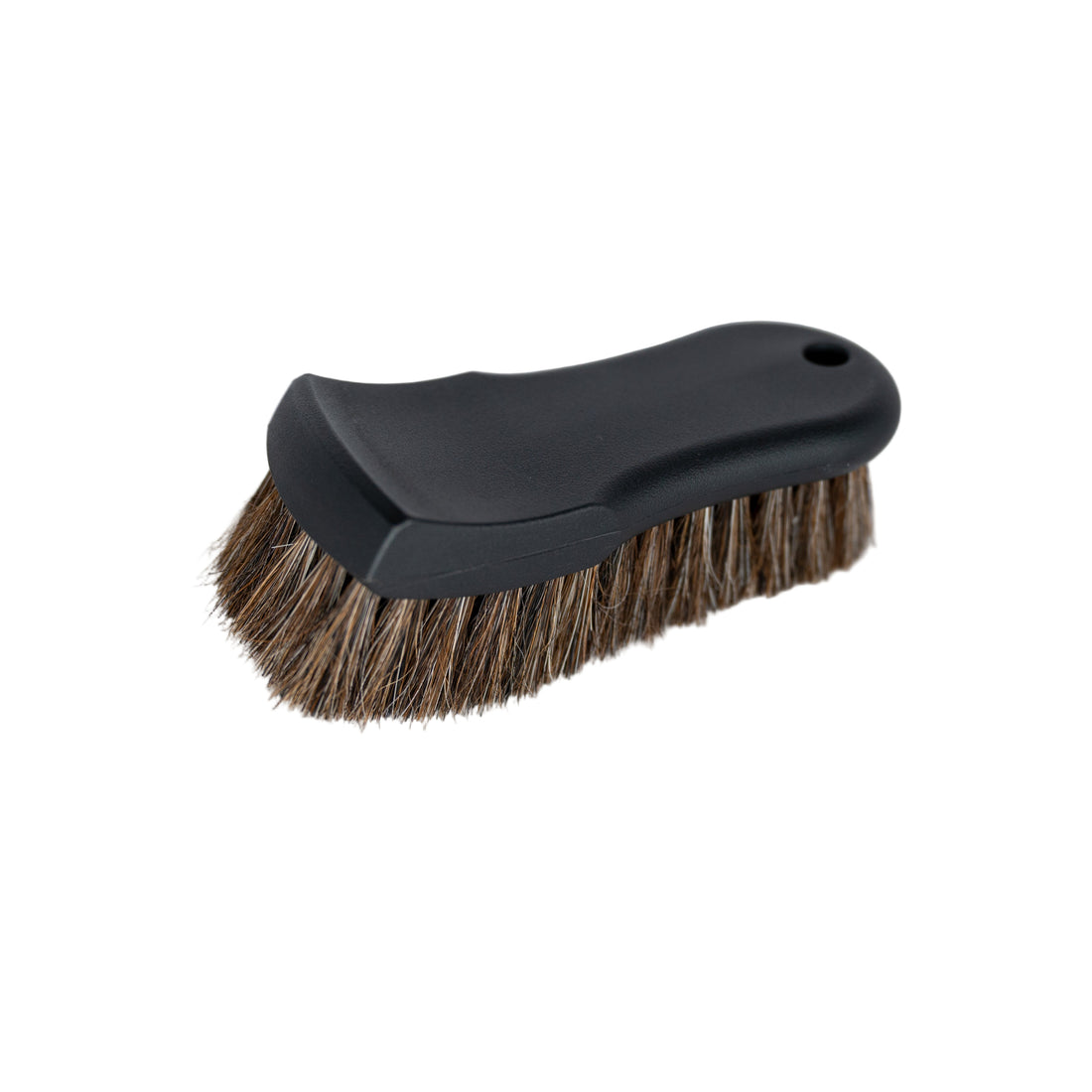 Black brush with bristles on a white background