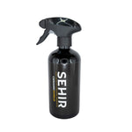 Black spray bottle with 'SEHIR' branding on a white background