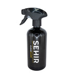 Black spray bottle with 'SEHIR' branding on a gray background