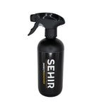 Black spray bottle with 'SEHIR' branding on a gray background