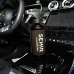 SEHIR car interior cleaning spray bottle on a car dashboard